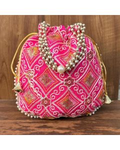 Unravel India Hot Pink Embroidered Potli Bag with Pearl Handle | Designer Ethnic Clutch for Women