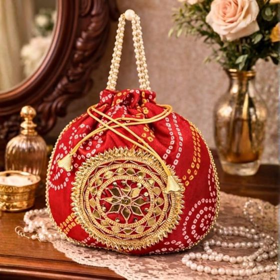 Unravel India Red Bandhani Potli Bag for Women with Pearl Handle & Heavy Zari Work | Ethnic Wedding Accessory