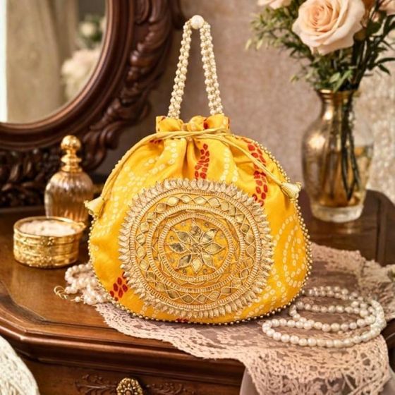 Unravel India Yellow Bandhani Potli Bag with Pearl Handle & Zari Embroidery | Festive Ethnic Handbag for Women