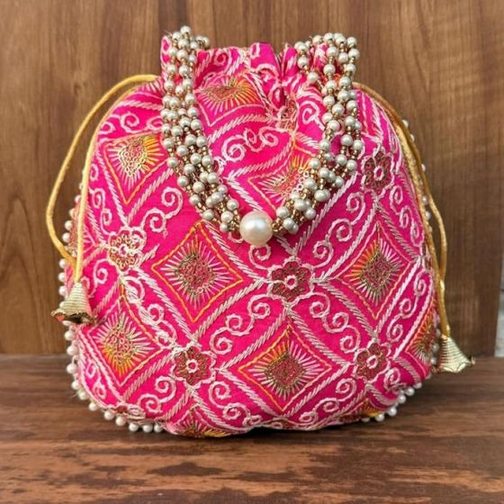 Unravel India Hot Pink Embroidered Potli Bag with Pearl Handle | Designer Ethnic Clutch for Women