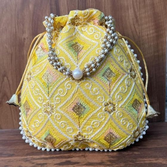 Unravel India Handcrafted Yellow Brocade Pearl Potli Bag for Women | Festive & Wedding Ethnic Potli