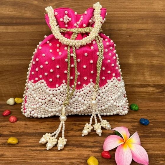 Unravel India Handcrafted Hot Pink Velvet Pearl Potli Bag for Women | Bridal Wedding Potli