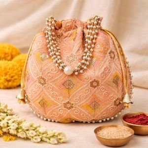 Unravel India Peach Embroidered Potli Bag with Pearl Handle | Traditional Wedding Clutch for Women