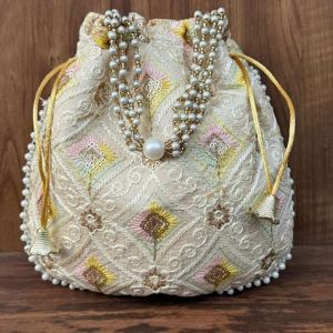 Unravel India Handcrafted Off White Brocade Pearl Potli Bag for Women | Bridal & Wedding Ethnic Handbag
