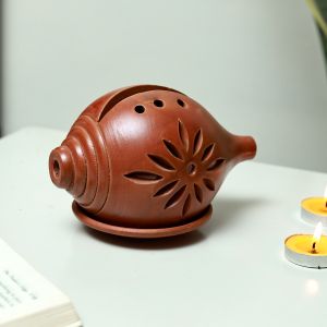 Unravel India handpainted brown "Terracotta Shank" shaped tea light holder
