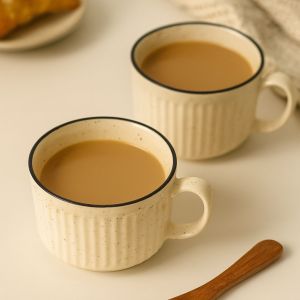Unravel India "Rippled Pattern" Off-white Ceramic Tea/Coffee Mug(2 Mug)