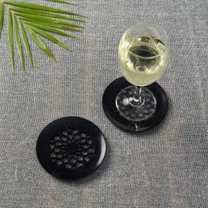Unravel India Handcarved black circular coaster in Soap Stone(Set of 2)