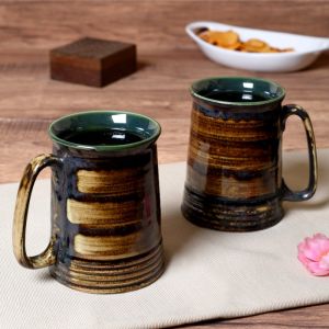 Unravel India ceramic handpainted beer mug set (Set of 2)