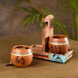 Unravel India warli handpainted terracotta kullad with wooden holder stand
