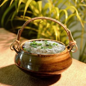 Unravel India ceramic metallic studio biryani serving bowl